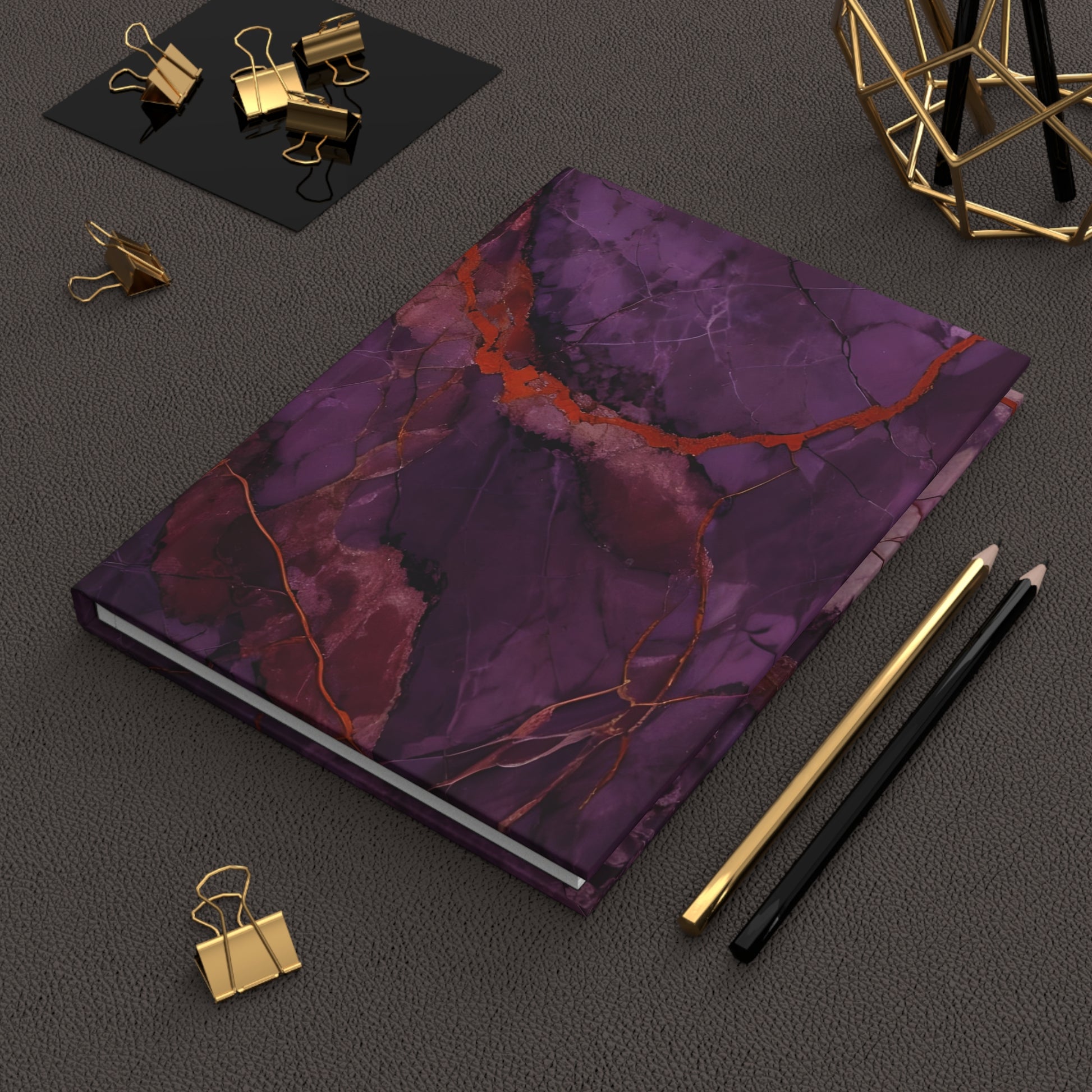 Amethyst Current hardcover journal on desk with pencils and stationery