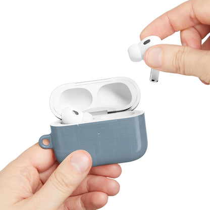 Hand placing AirPods into Blue Grey Linen AirPods case with soft linen texture design