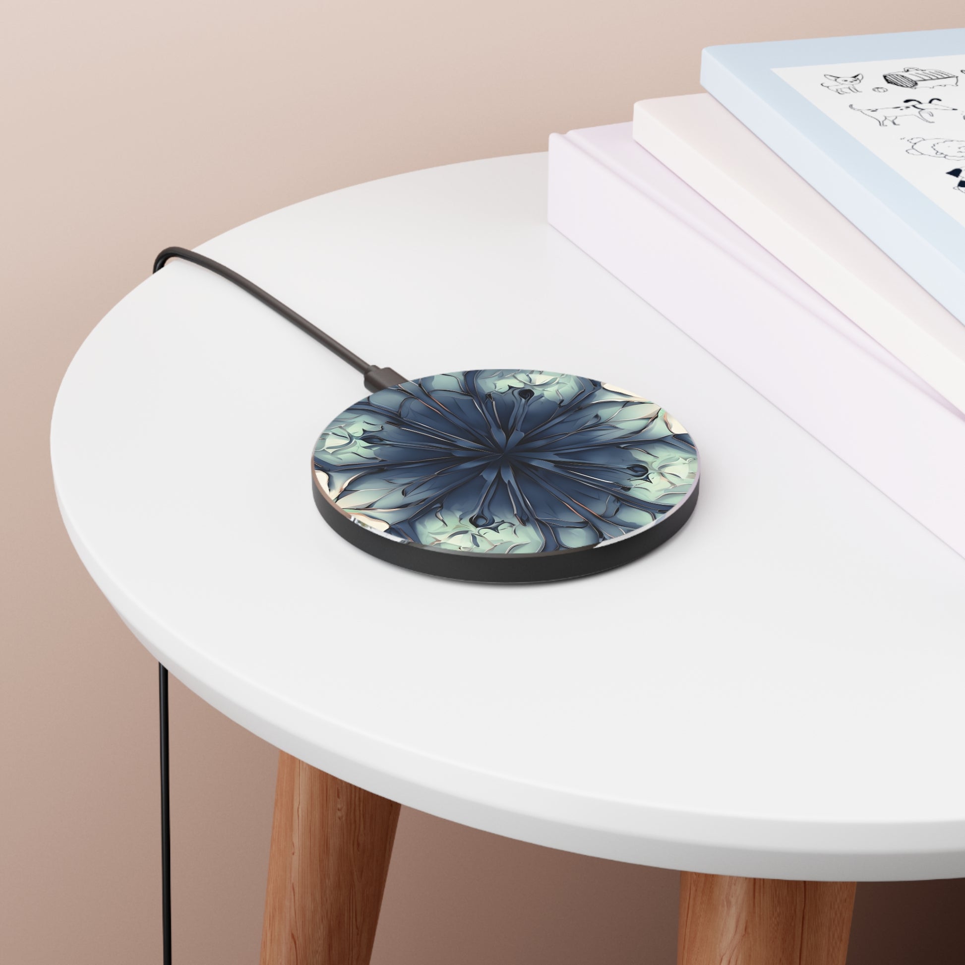 Indigo Mosaic indigo mandala art Qi wireless charger on bedside table with books