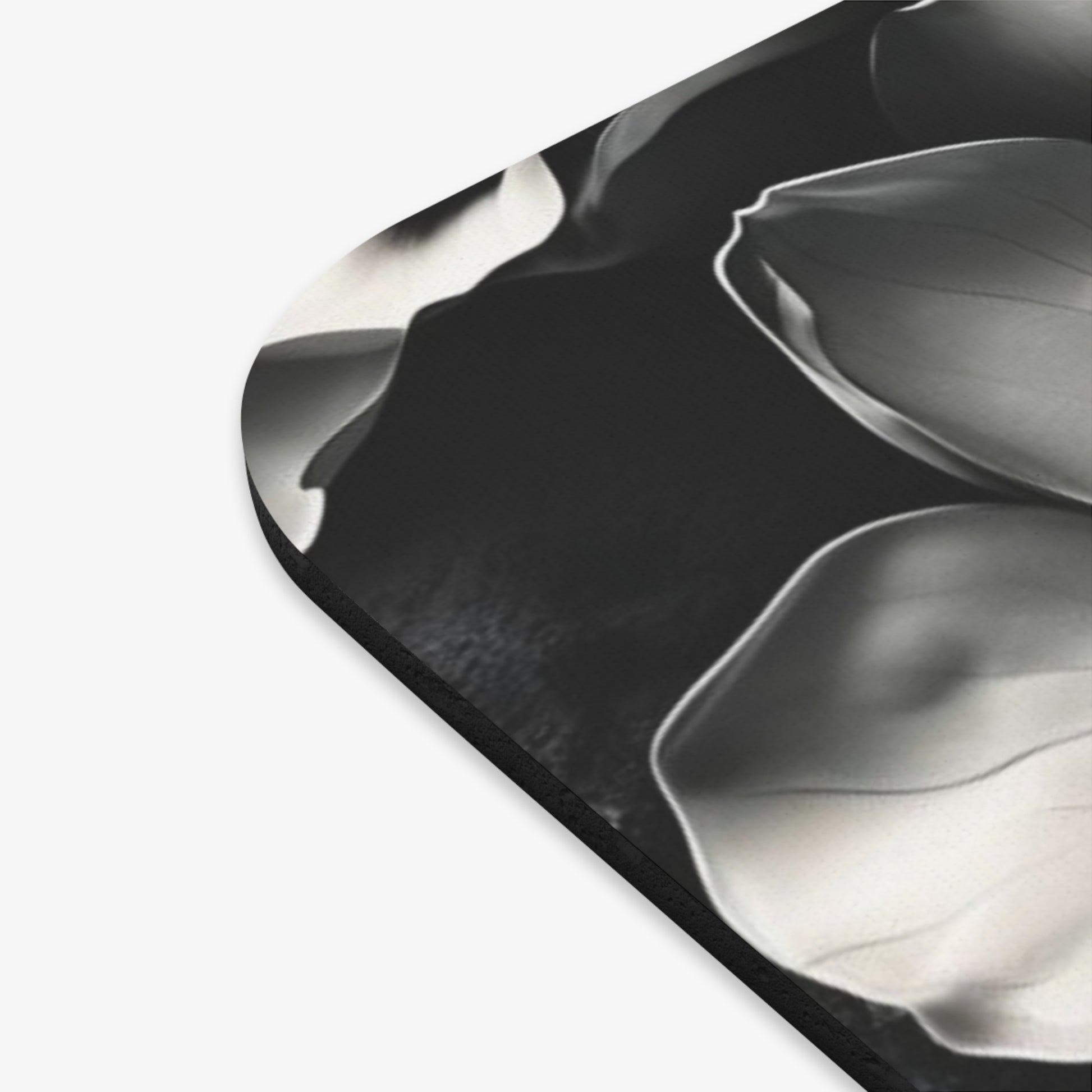Close-up of Monochrome Magnolia mouse pad showing printed magnolia design detail