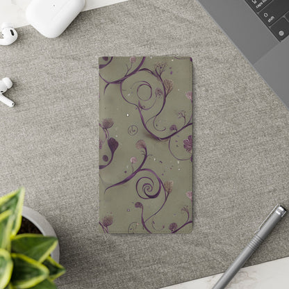 Twilight Thistle Bloom Samsung Galaxy wallet flip phone case on a desk beside stationery featuring purple thistle floral design and folio card holder
