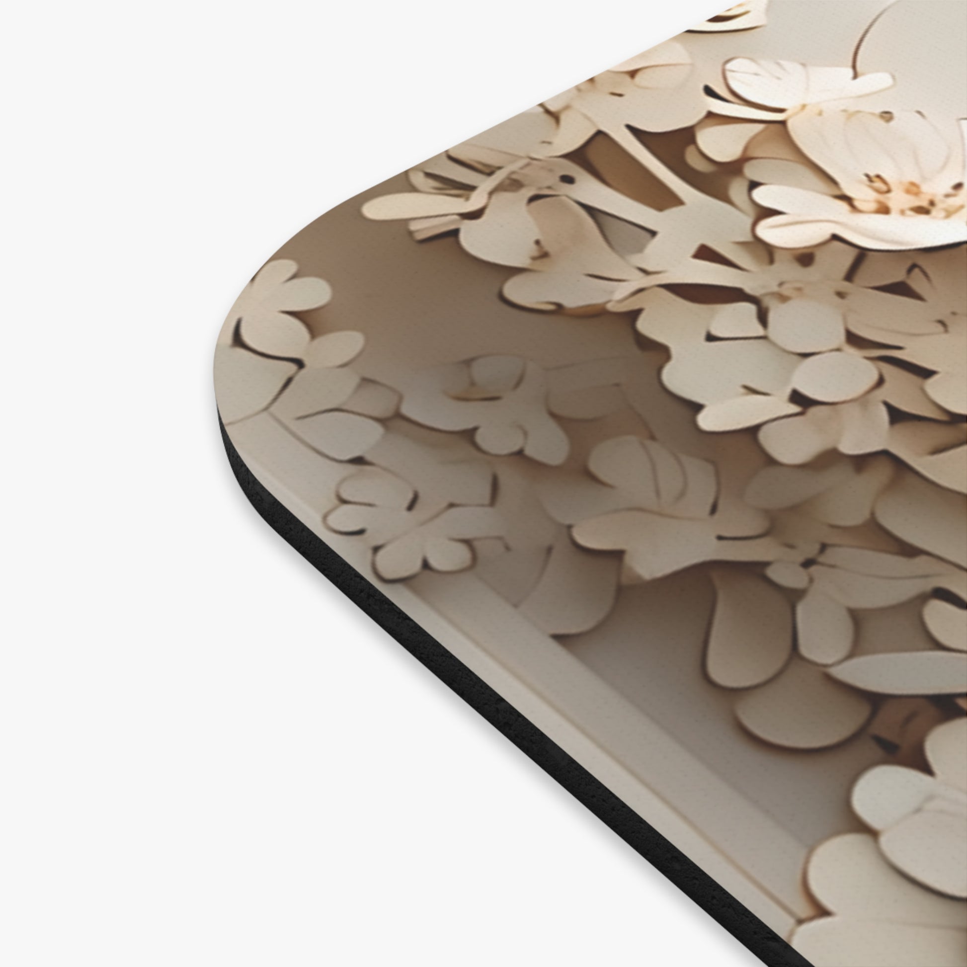 Moonlit Garden mouse pad beside laptop displaying botanical floral artwork