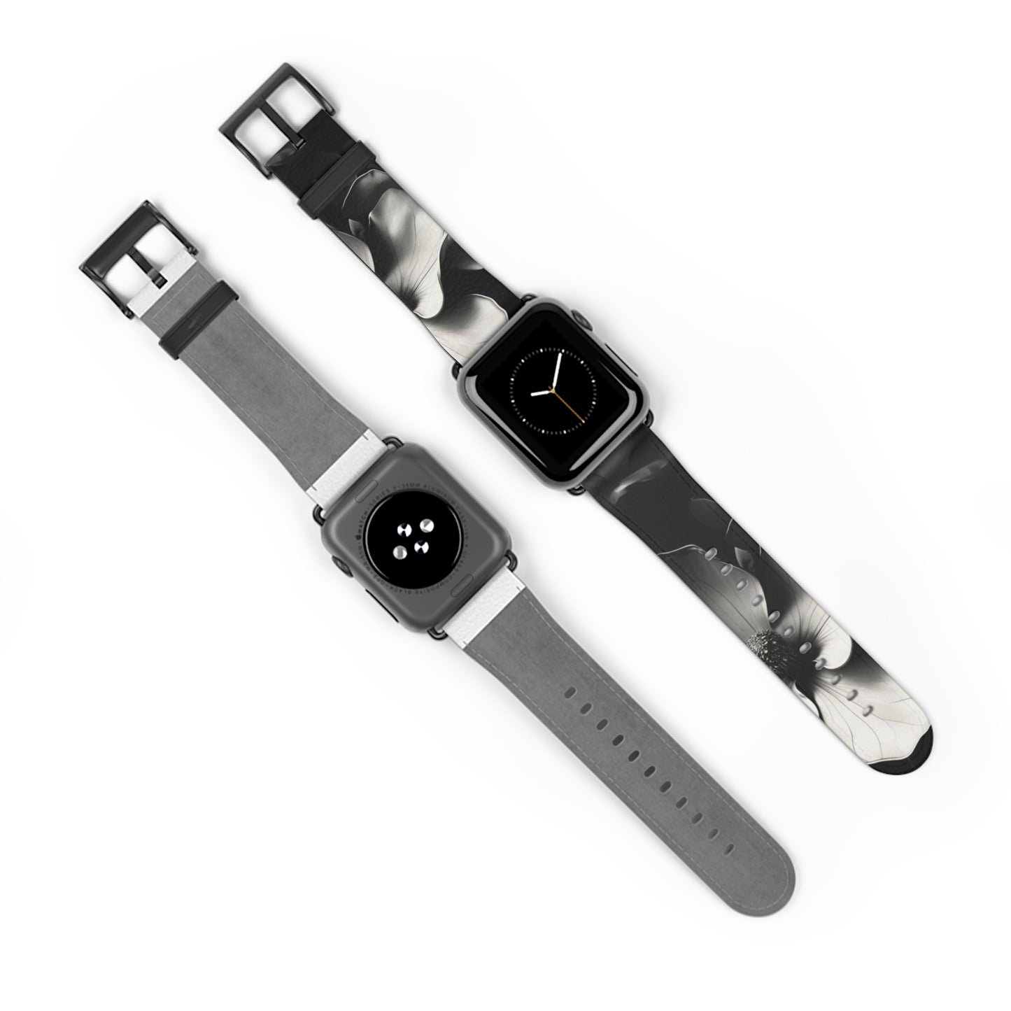 Monochrome Magnolia Apple Watch bands shown on two watches front and back highlighting black and white magnolia flower artwork