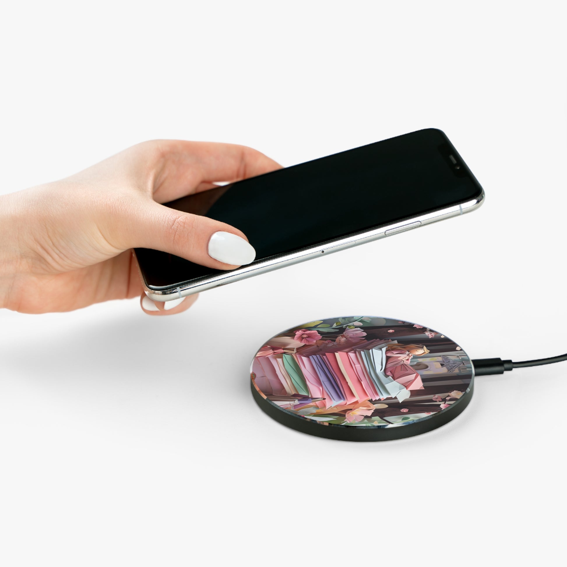 Hand placing smartphone on A Good Night's Sleep cozy design Qi wireless charger