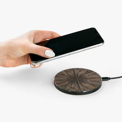 Hand placing smartphone on Earthstone Mandala brown stone mandala design Qi wireless charger