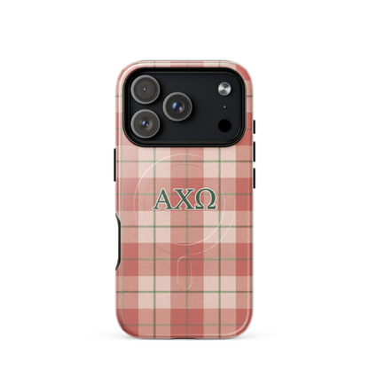 Alpha Chi Omega plaid iPhone 17 Pro case with red and green tartan pattern and olive green AXO Greek letters MagSafe compatible on white background