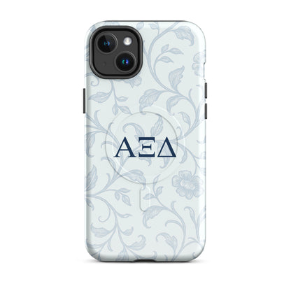 Alpha Xi Delta iPhone 14 Plus case with blue floral toile design and Greek letters, slim durable cover with MagSafe compatibility