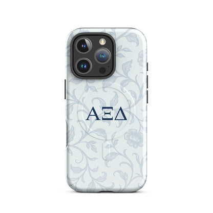 Alpha Xi Delta iPhone 16 Pro case with blue floral toile design and Greek letters, slim durable cover with MagSafe compatibility