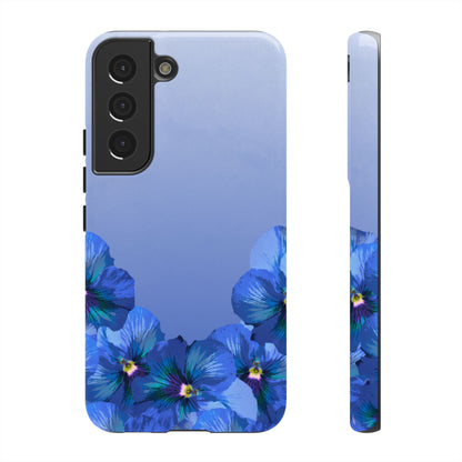 Blue pansy floral gradient Samsung Galaxy S22 phone case shown in front and side view with botanical pansy flower design