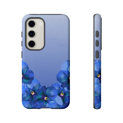 Blue pansy floral gradient Samsung Galaxy S23 phone case shown in front and side view with botanical pansy flower design