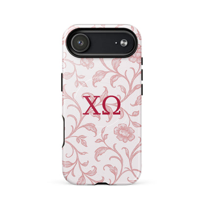 Chi Omega iPhone 17 Air case featuring delicate floral toile pattern in cardinal red with XO Greek letters, MagSafe compatible