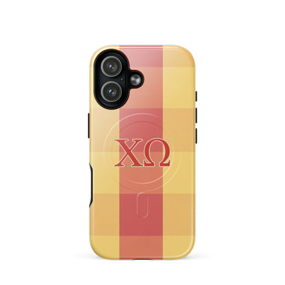Chi Omega iPhone 17 case featuring plaid pattern in cardinal and straw with XO Greek letters, MagSafe compatible