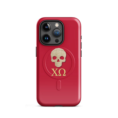 Chi Omega iPhone 15 Pro case with ivory skull and XO Greek letters on cardinal background, MagSafe compatible, glossy finish