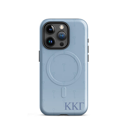 Kappa Kappa Gamma iPhone 15 Pro case with subtle key pattern in soft blue and ΚΚΓ Greek letters, slim protective aesthetic phone cover