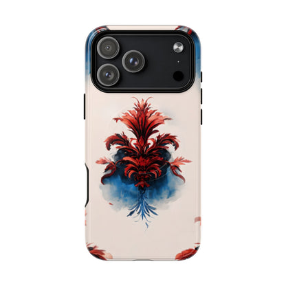 Crimson Plume iPhone 17 Pro Max MagSafe case featuring an elegant red damask floral motif with deep blue watercolor accents on a soft neutral background.