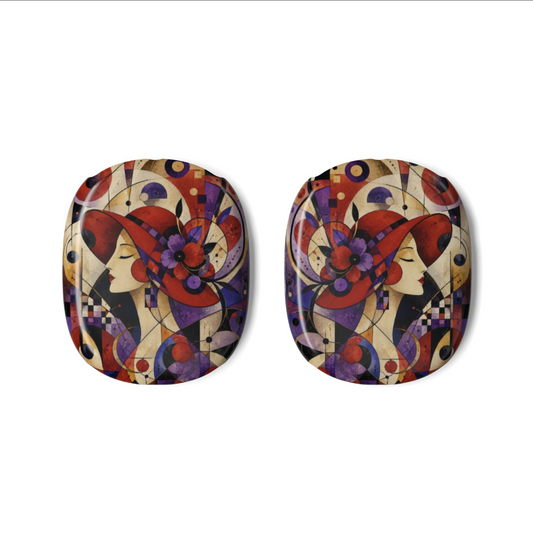 A pair of oval-shaped AirPods Max Covers for Red Hat Society members featuring a colorful Art Deco style design with stylized faces, red hats, and geometric shapes on a cream background.
