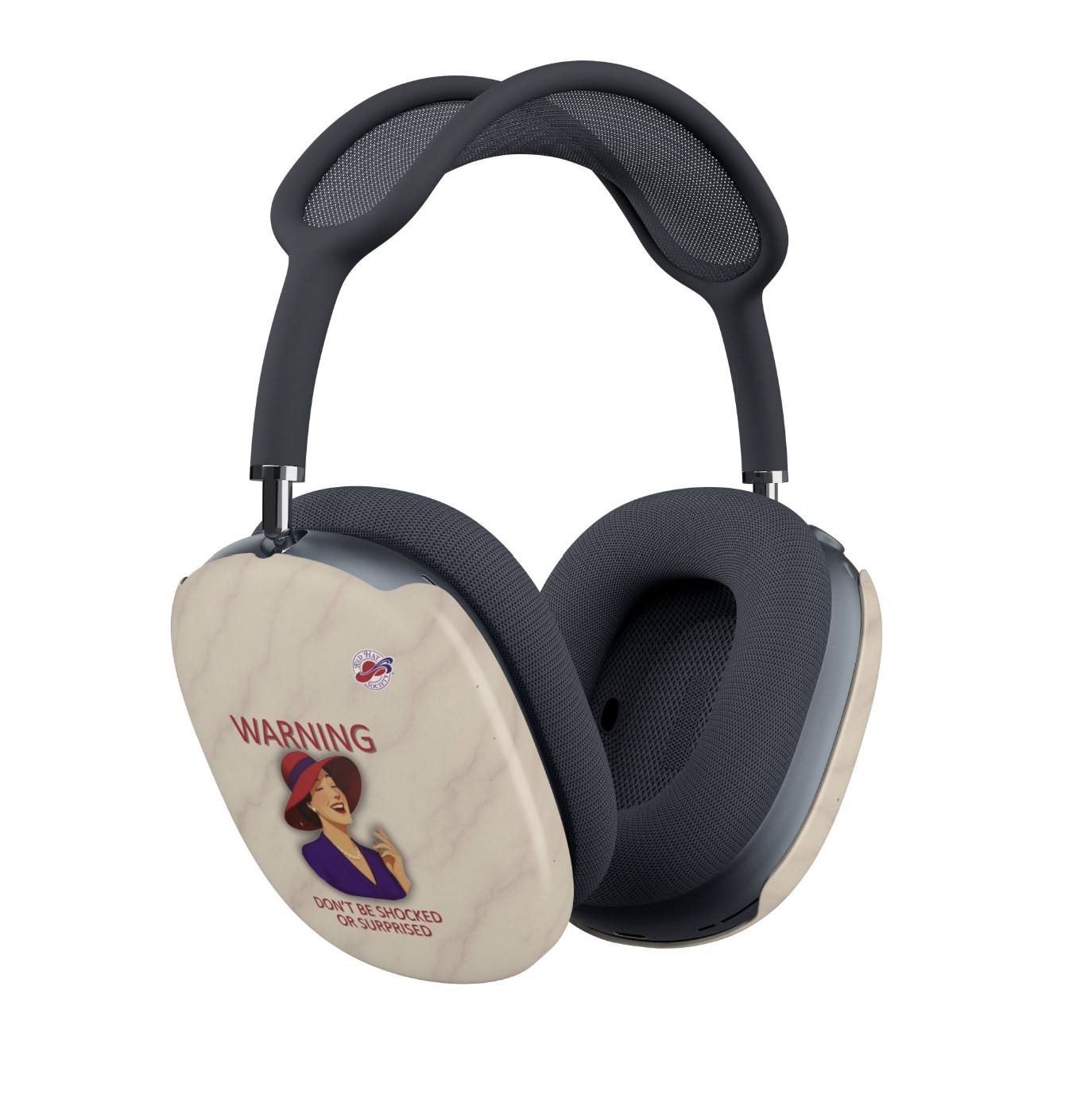 Red Hat Society AirPods Max covers shown on dark blue headphones. The covers show a laughing woman in a red hat and the text reads "WARNING DON'T BE SHOCKED OR SURPRISED", alongside the Red Hat Society Logo.