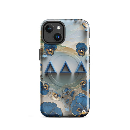 Tri Delta Origami Pansy MagSafe iPhone 14 case with bold ΔΔΔ Greek letters surrounded by origami pansy blossoms in blue, gold, and cream