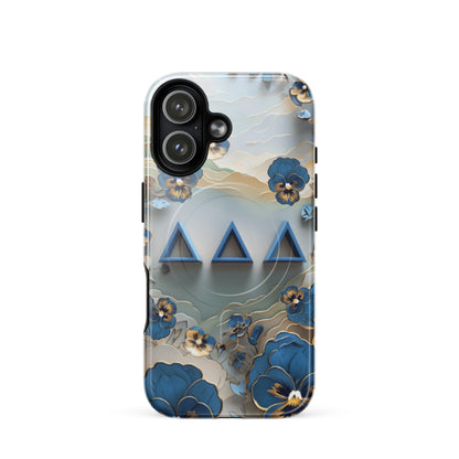 Tri Delt sorority iPhone 17 MagSafe case featuring origami-inspired pansy blossoms and the timeless symbols of Delta Delta Delta sisterhood
