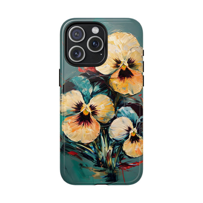 Golden Pansy Cascade floral iPhone 15 Pro Max MagSafe case featuring painterly yellow and cream pansy flowers with deep violet centers on a teal background.
