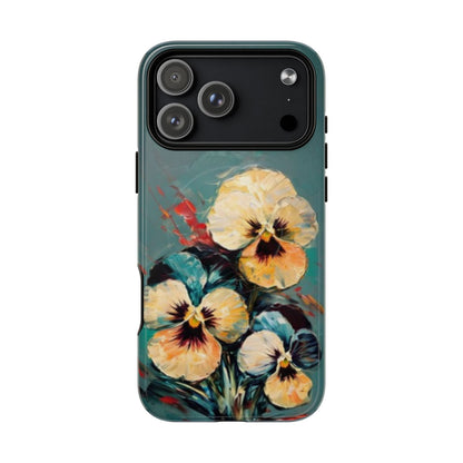 Golden Pansy Cascade floral iPhone 17 Pro Max MagSafe case featuring painterly yellow and cream pansy flowers with deep violet centers on a teal  background.
