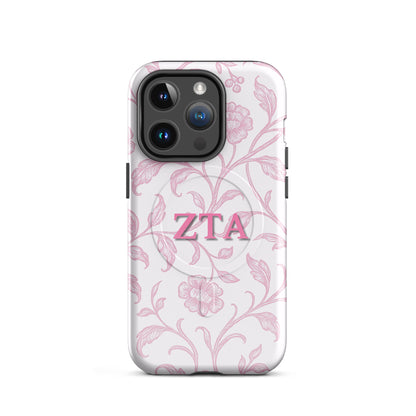Zeta Tau Alpha iPhone 14 Pro case with blush floral pattern pink ZTA letters MagSafe compatible slim case on white background