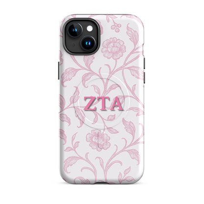 Zeta Tau Alpha iPhone 15 Plus case with blush floral pattern pink ZTA letters MagSafe compatible slim case on white background