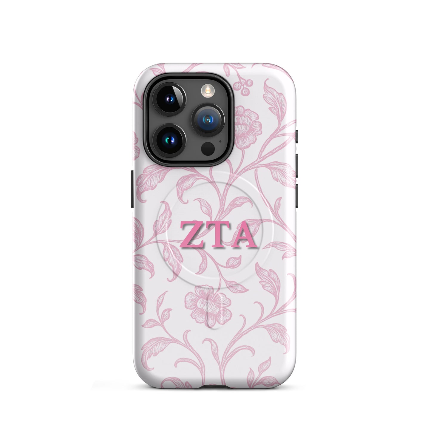 Zeta Tau Alpha floral toile iPhone 15 Pro case with pink vine pattern and ZTA Greek letters MagSafe compatible on white background