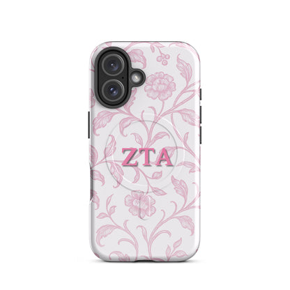 Zeta Tau Alpha iPhone 16 case with blush floral pattern pink ZTA letters MagSafe compatible slim case on white background
