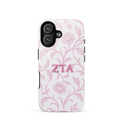 Zeta Tau Alpha floral toile iPhone 17 case with pink vine pattern and ZTA Greek letters MagSafe compatible on white background
