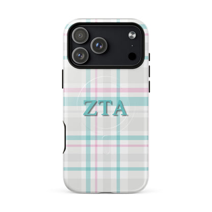 Zeta Tau Alpha plaid iPhone 17 Pro Max case with pastel teal and pink tartan pattern and ZTA Greek letters MagSafe compatible on white background