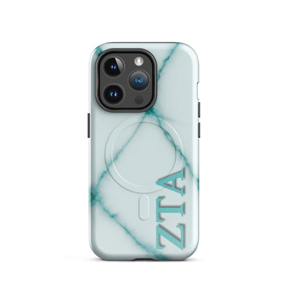 Zeta Tau Alpha ZTA iPhone 14 Pro case white marble design with teal veins and vertical Greek letters MagSafe ring close-up on white background