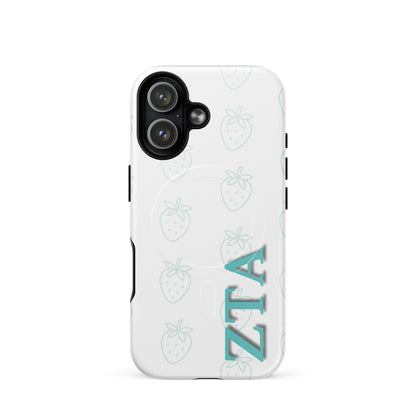Zeta Tau Alpha strawberry pattern iPhone 17 case with light teal strawberries and vertical ZTA Greek letters MagSafe compatible on white background